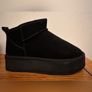 Black Platform Bootie. Size 10. Never worn.